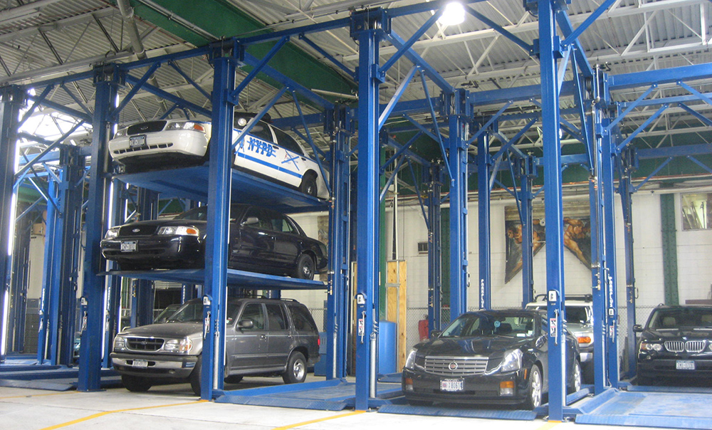 parking lift and triple car stacker Image